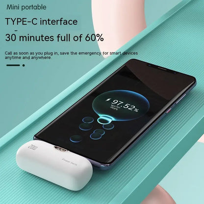 Mini Portable Pocket Wireless Capsule Power Bank with TYPE-C interface charging a smartphone up to 60% in 30 minutes