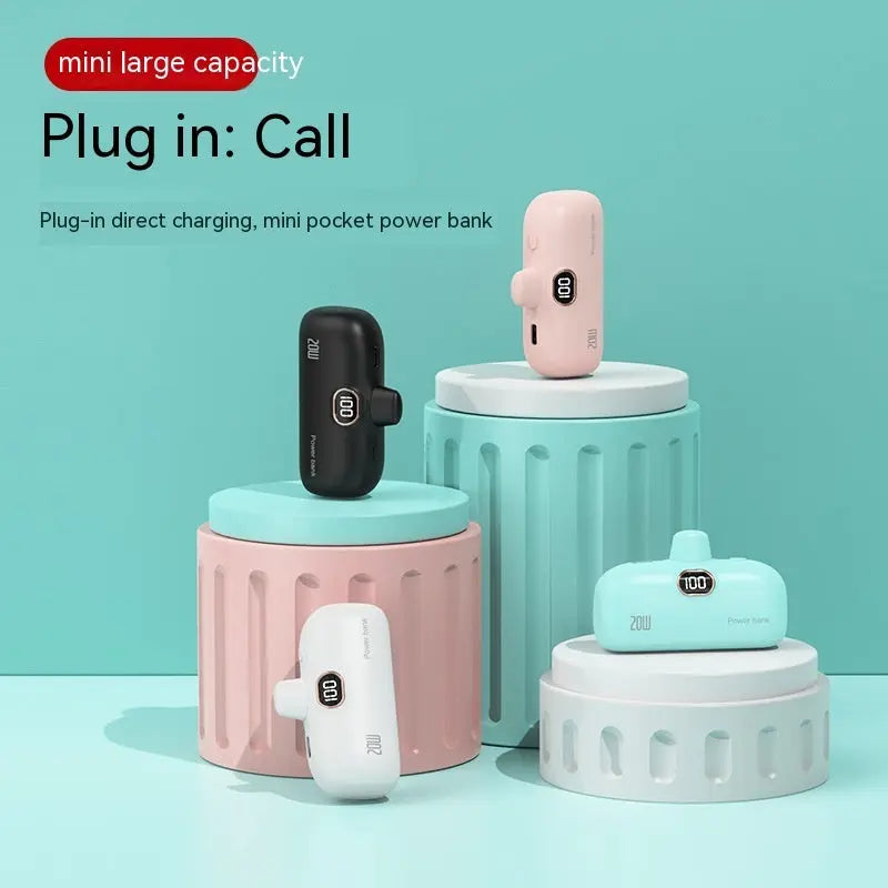 Mini large capacity plug-in direct charging portable power bank in various colors on pastel cylindrical stands.